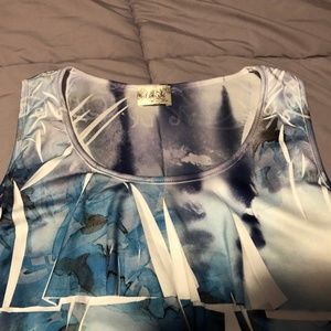 Multi-layered blouse, front: many layers floating.